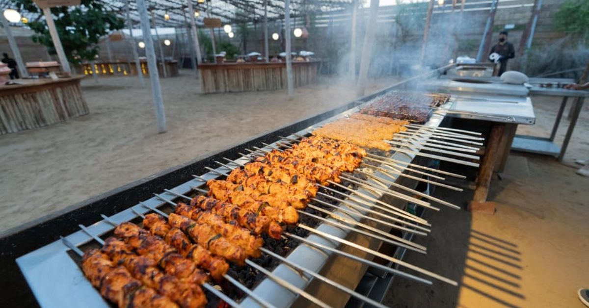 Aventura en el desierto de Dubái con quad, camello y cena barbacoa